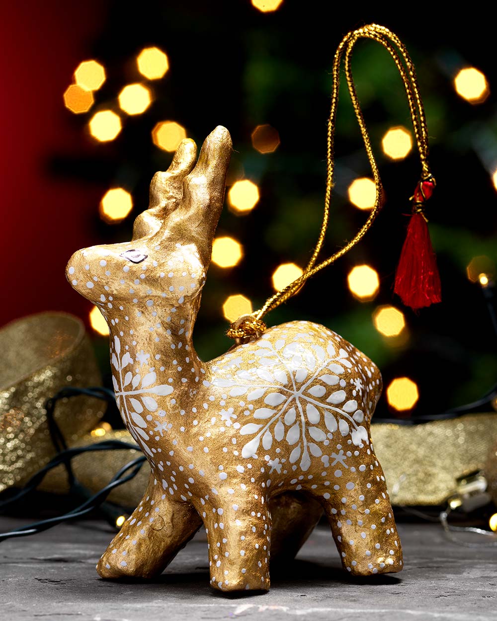 Handmade Reindeer Christmas Decoration gold hand crafted in India, fair trade and bio degradable