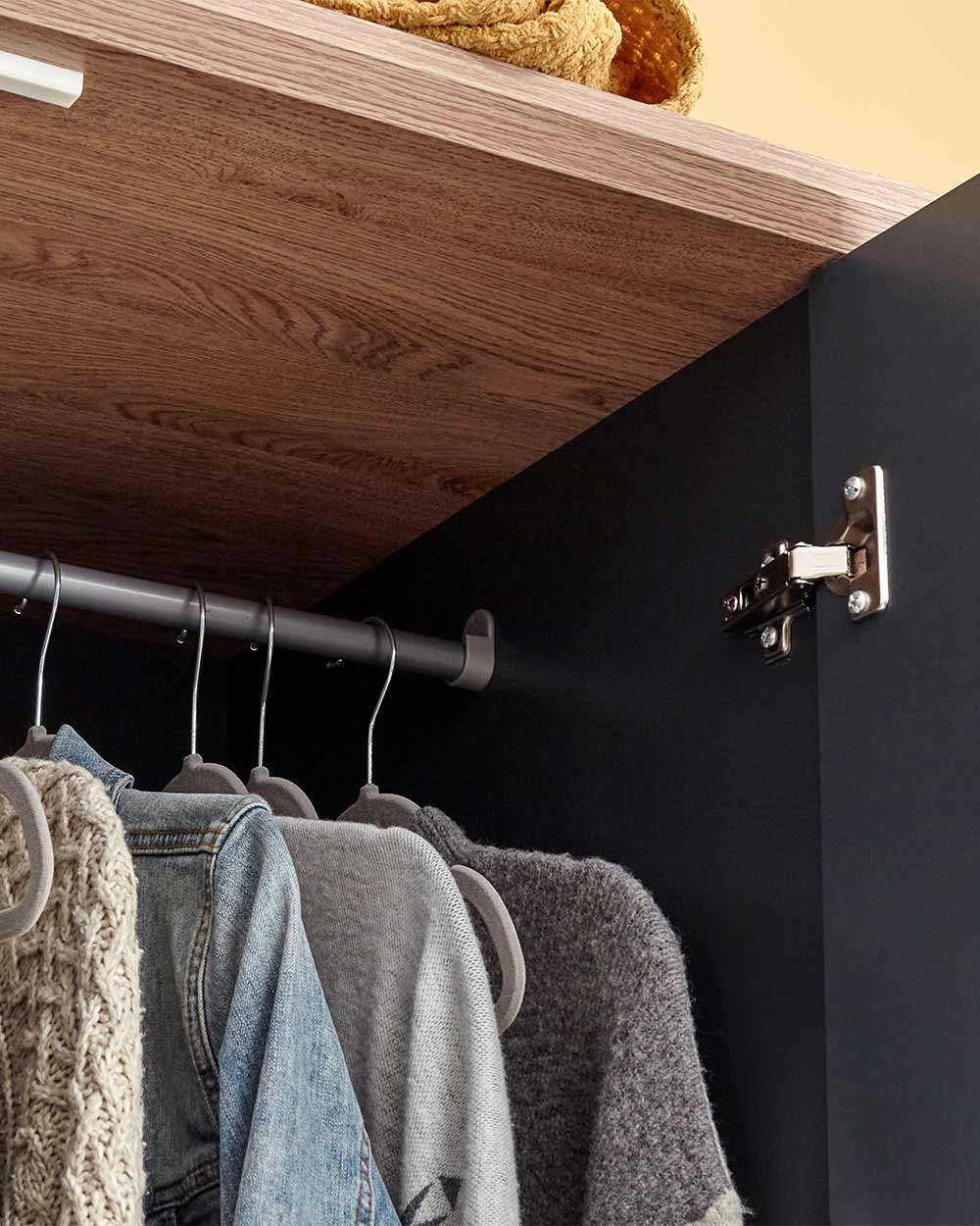 example of hanging space in the wardrobe and the fastenings