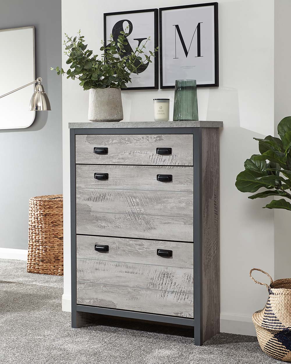 Looking for modern inspired shoe storage? This slim shoe cabinet will create the tidiest of bedrooms, living rooms, or hallways!  It's slender design makes it a smart choice for narrow spaces.