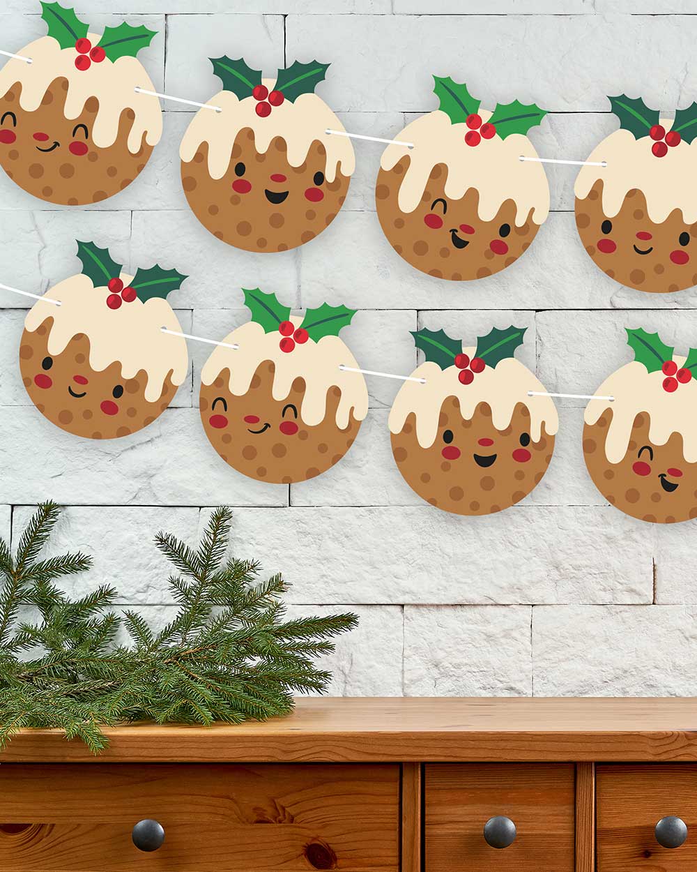 Introducing our delightful Christmas bunting with Christmas pudding Emoji faces. The perfect addition to your holiday decorations! This festive bunting features 16 charming Christmas pudding flags, each measuring 14.8cm by 16.4cm, and they're all double-sided with adorable emoji faces that will bring a smile to everyone's face. With a generous 10-meter white ribbon included, setting up your Christmas bunting couldn't be easier