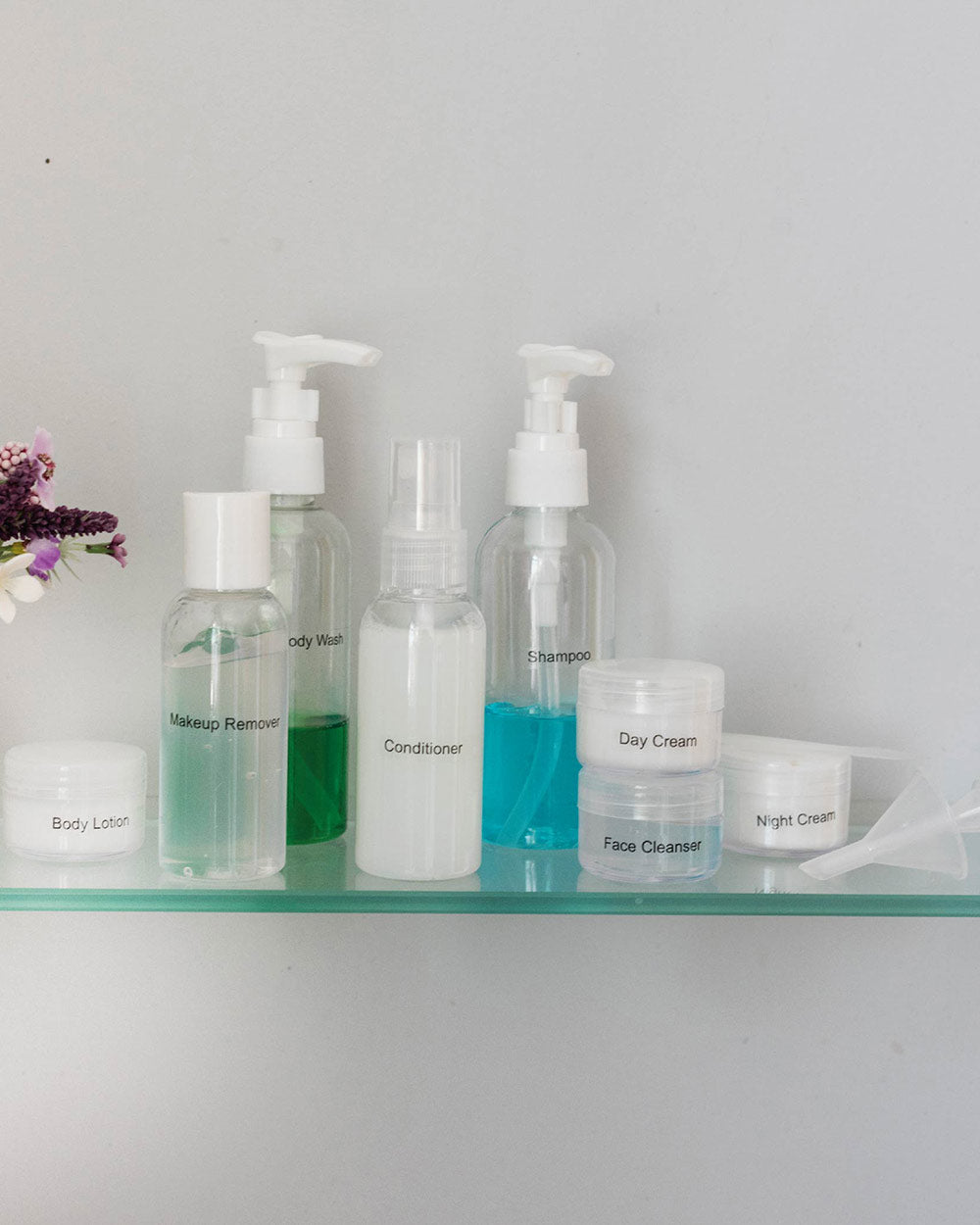 Lifestyle image of the bottles labelled and used