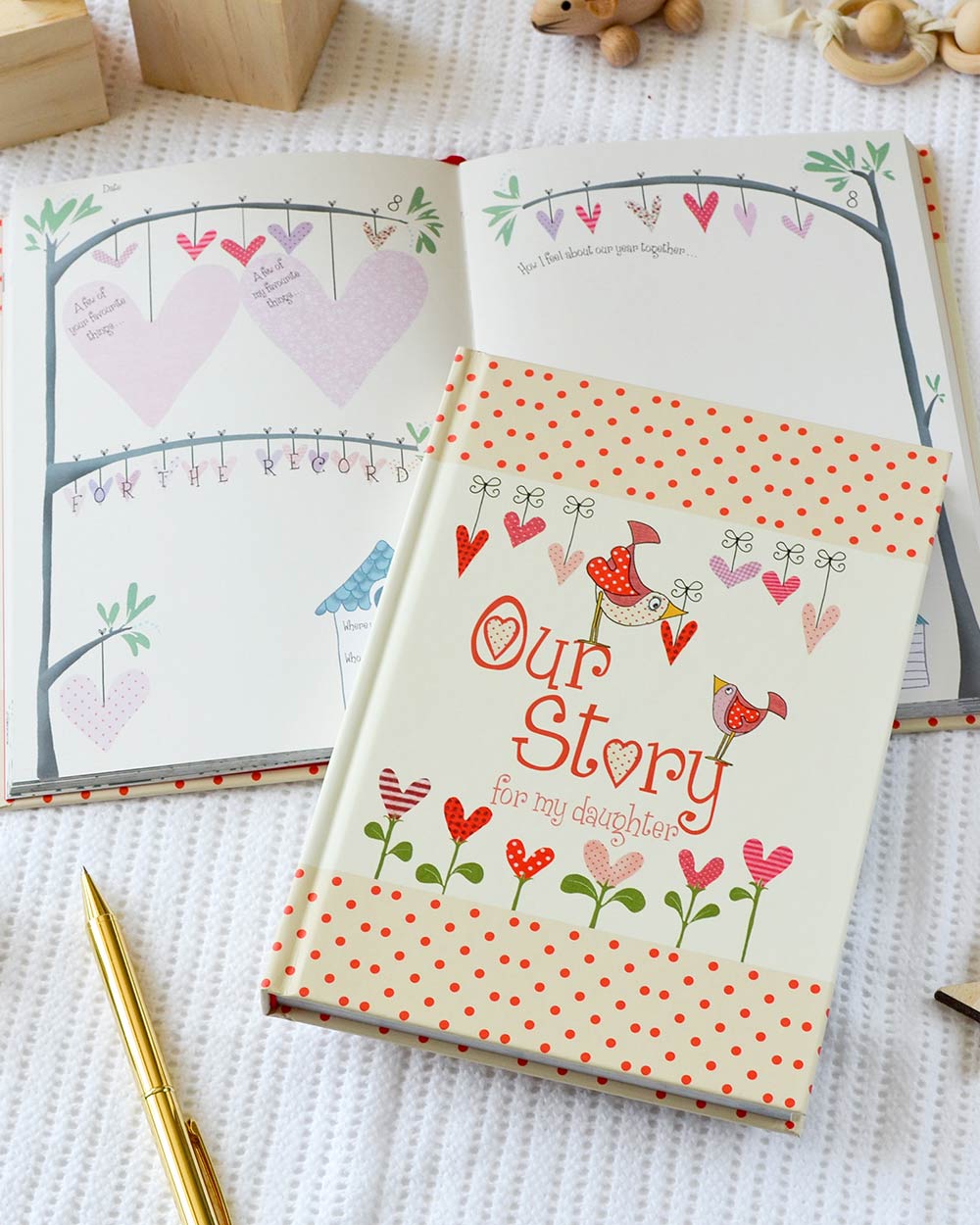 our story from you to me daughter journal memory book lifestyle photo of the cover and the book layed out