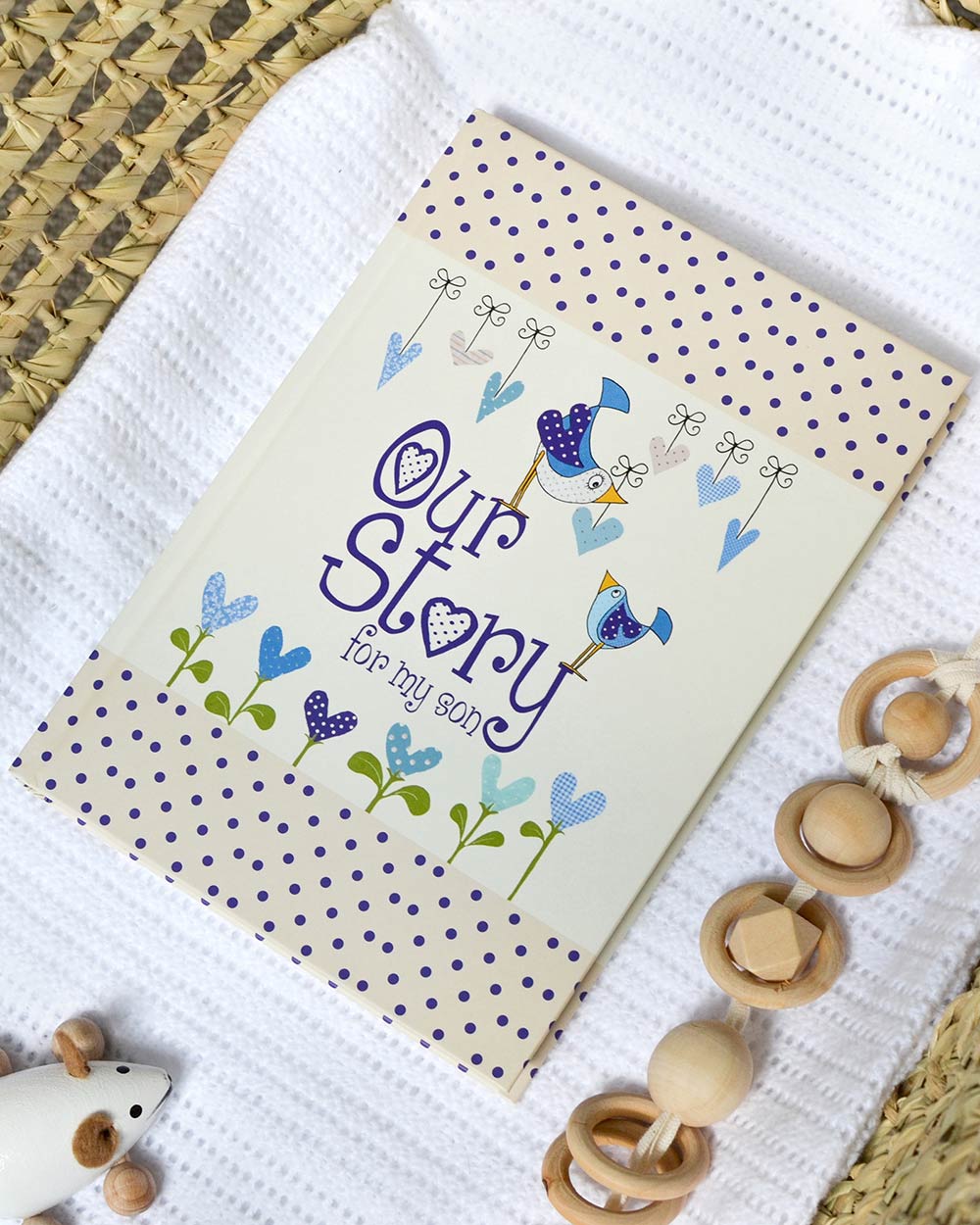 Memory Book Journal Our Story, for my Son lifestyle image of the front cover laying down