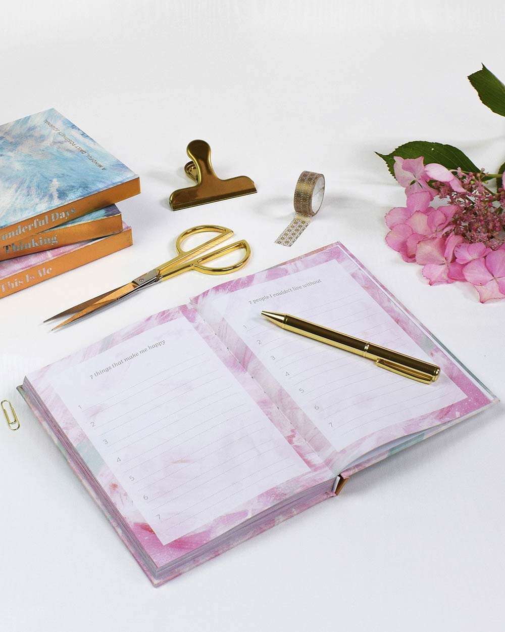 This is me journal/memory book displayed in a lifestyle scene with the book open