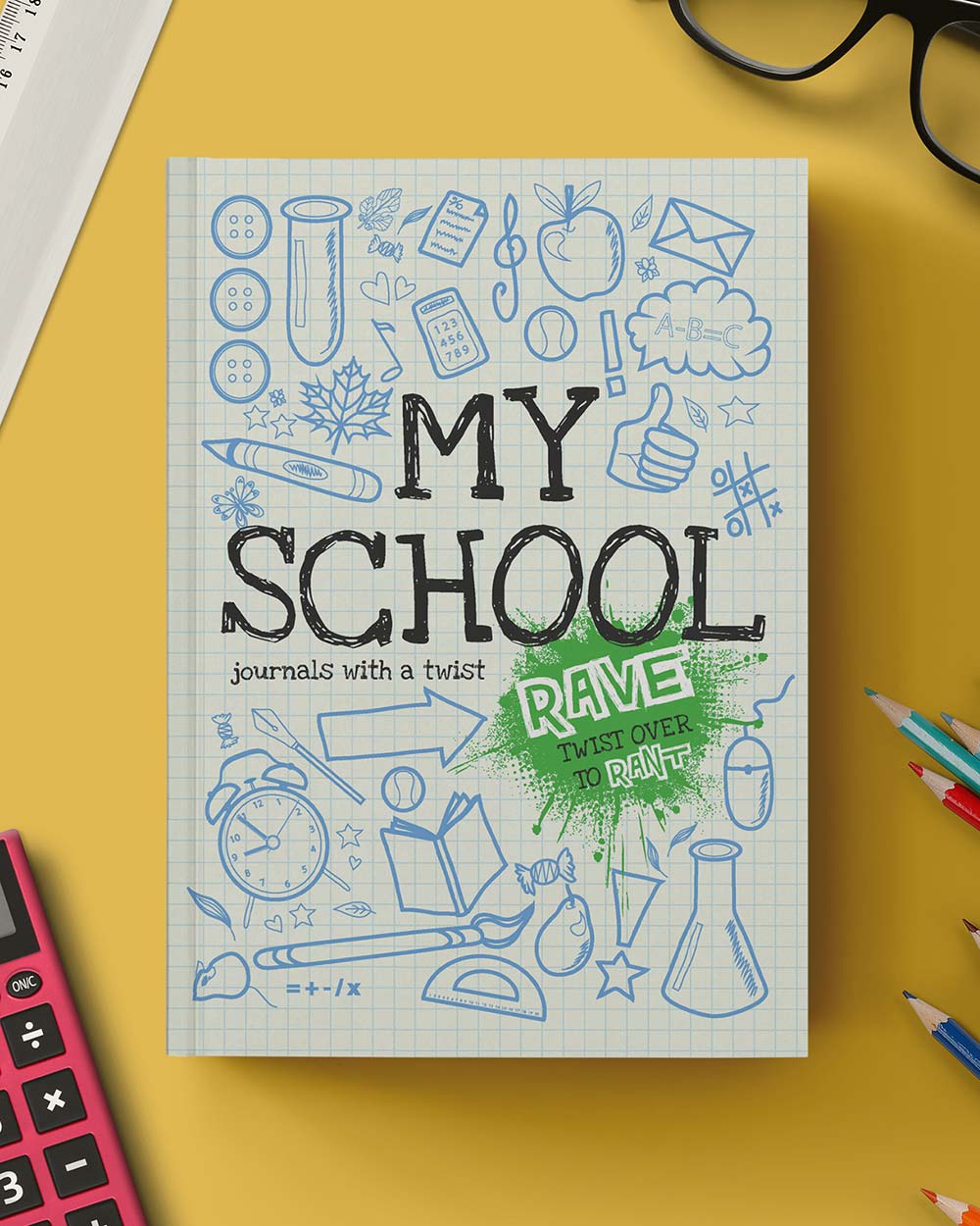 lifestyle image of my school rant and rave diary/ journal. Kids activity book photographed on a yellow desk