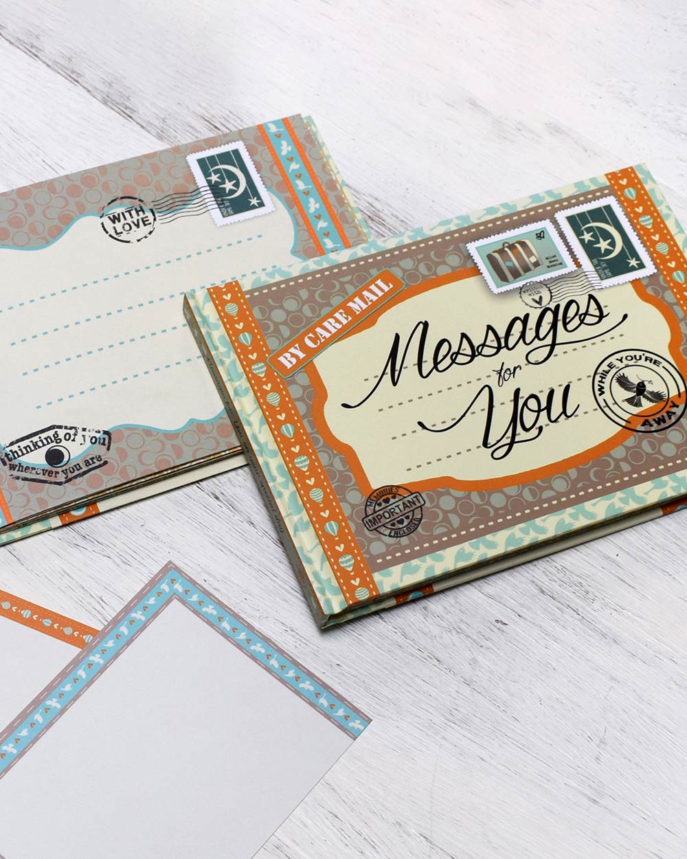 Keepsake Book Messages For You, While You’re Away. Lifestyle image of the front cover of the book and inside the book