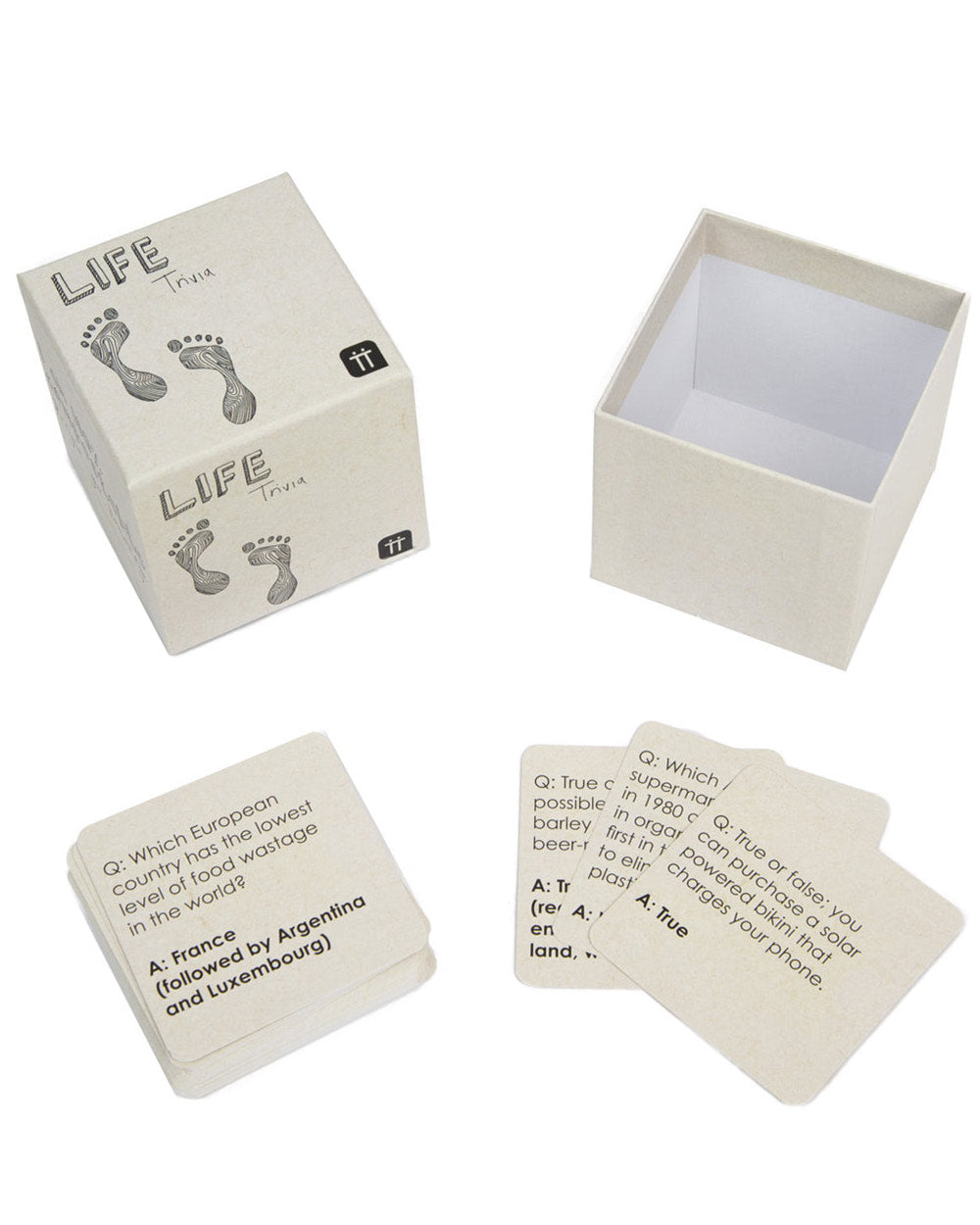 Life Trivia Game Eco Friendly Compostable. Photo of the box opened with some cards out on a white cut out back ground