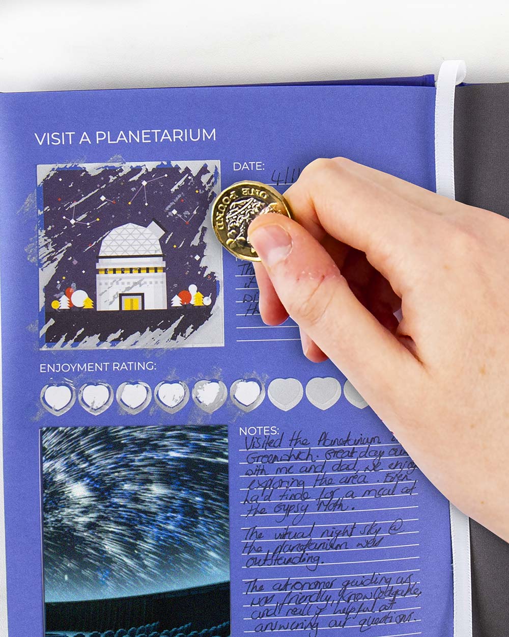 100 Things To Do With Dad Scratch Book Activity lifestyle image of hand scratching off the window