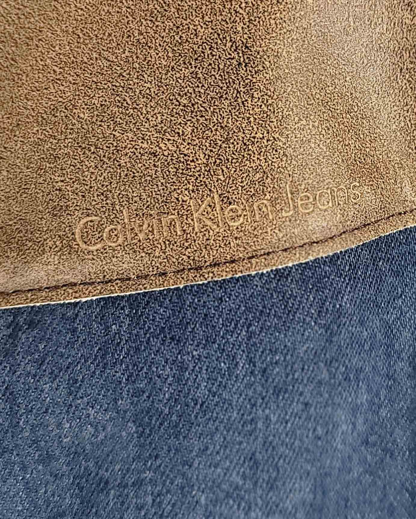 Womens Calvin Klein Blue Jeans with Brown Waist W28