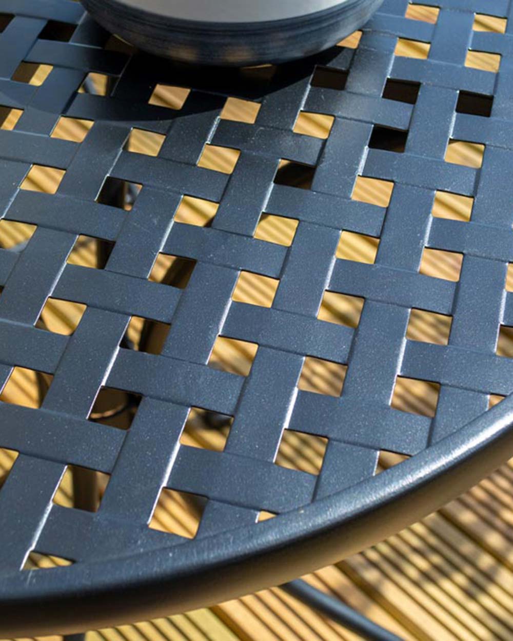 garden bistro set black matt lattice pattern Havana Rowlinson. Photo in a garden setting, close up of the black lattice design