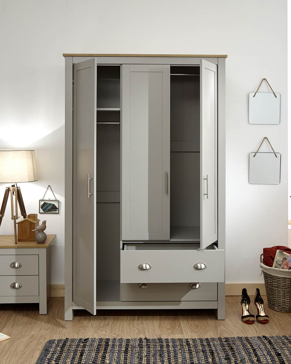 Lancaster 3 door 2 door wardrobe in a bedroom lifestyle setting with all doors open