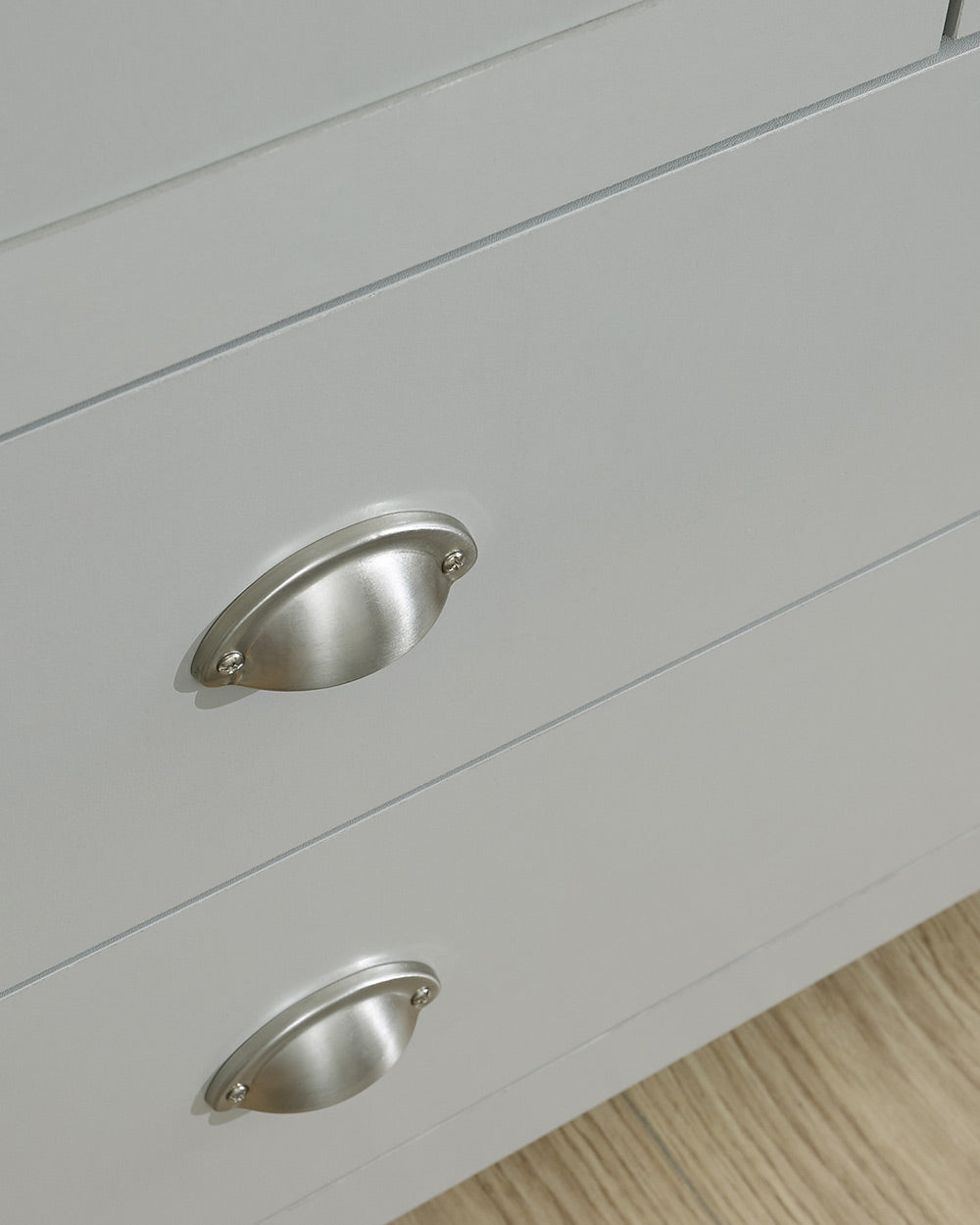 Lancaster 2 + 2 chest of drawers in grey in a lifestyle scene close up of the handles