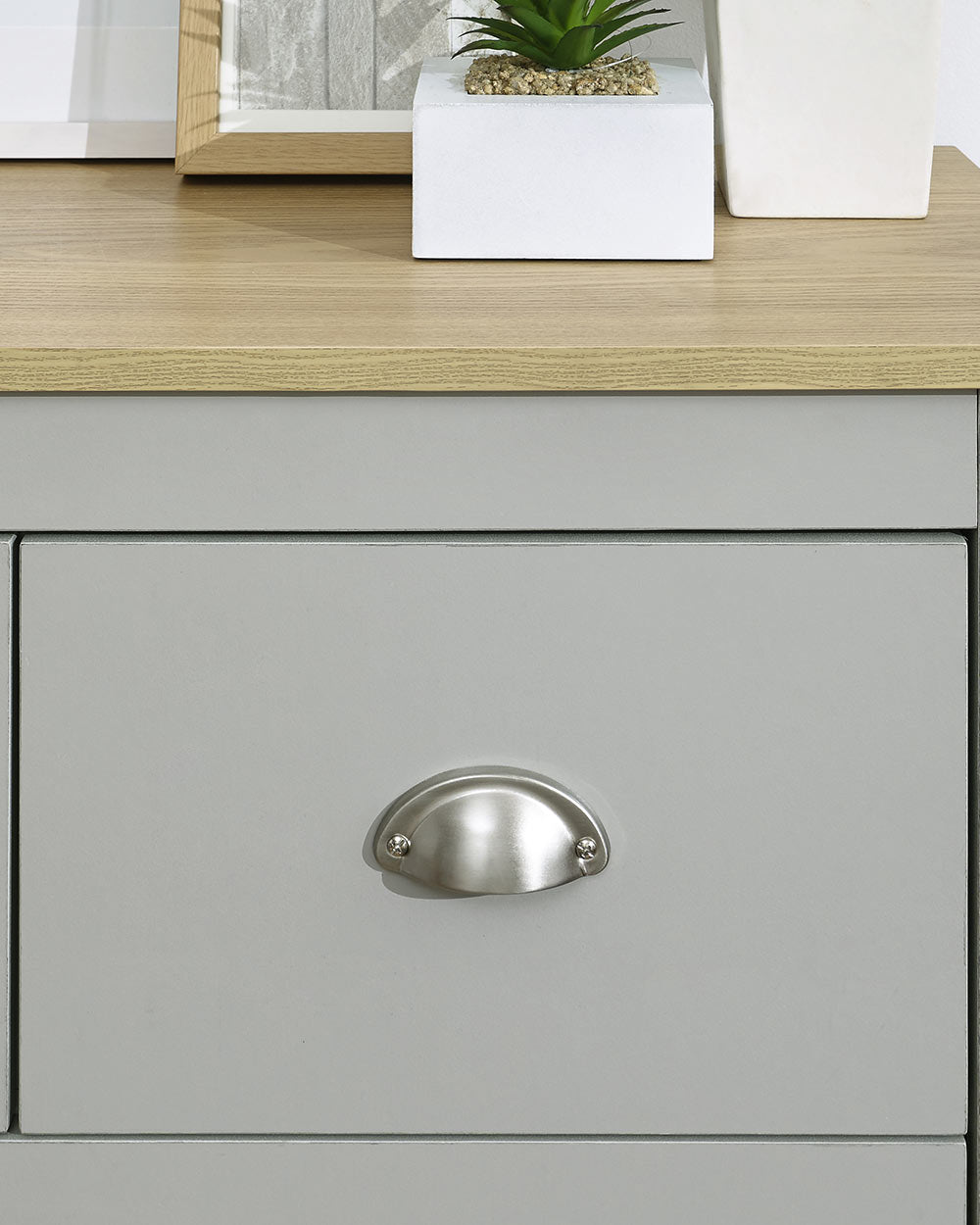 Lancaster 2 + 2 chest of drawers in grey in a lifestyle scene close up of the handles