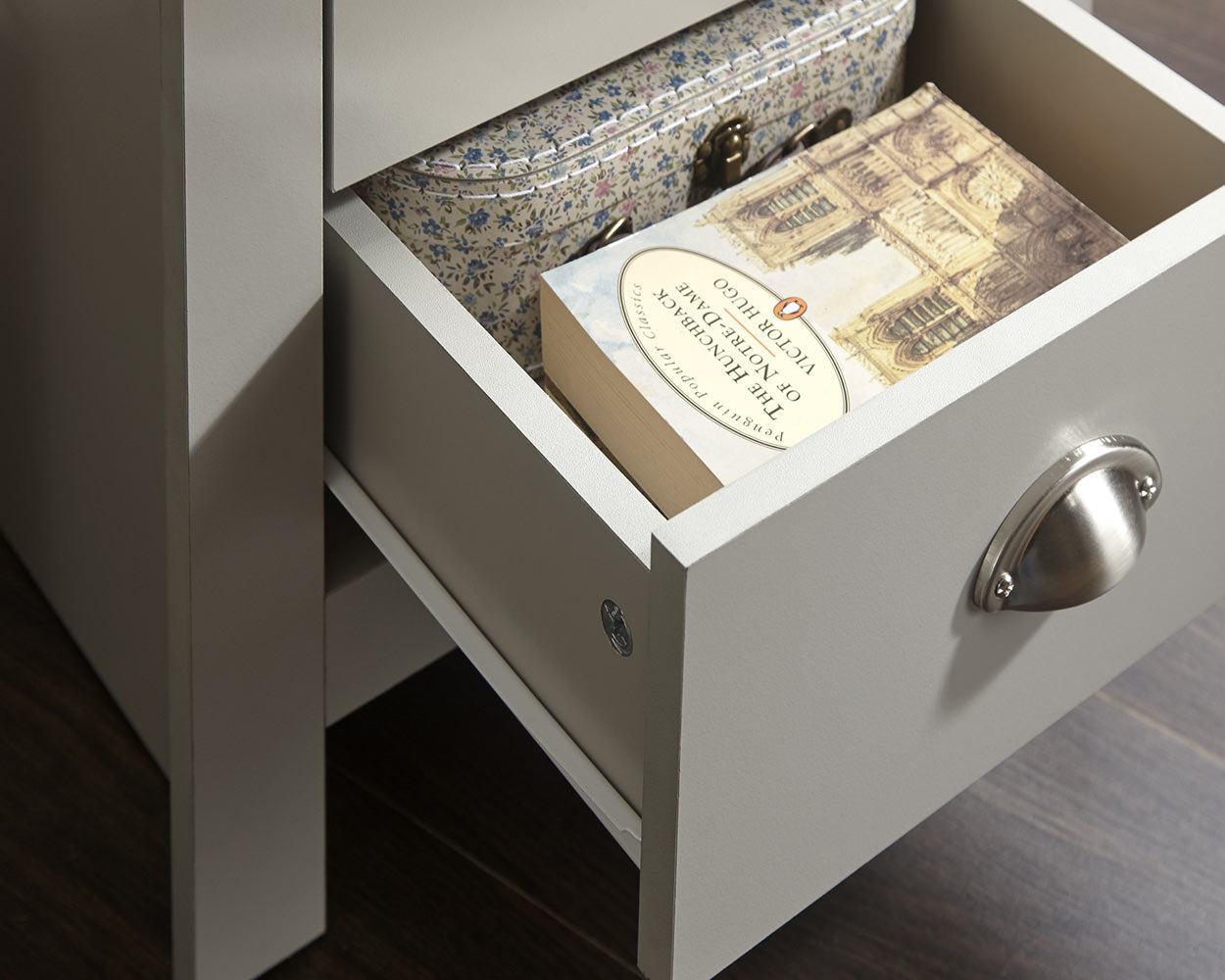 Lancaster 3 Piece Bedroom Furniture Set Grey lifestyle image in a bedroom of the bedside table close up of the drawer open