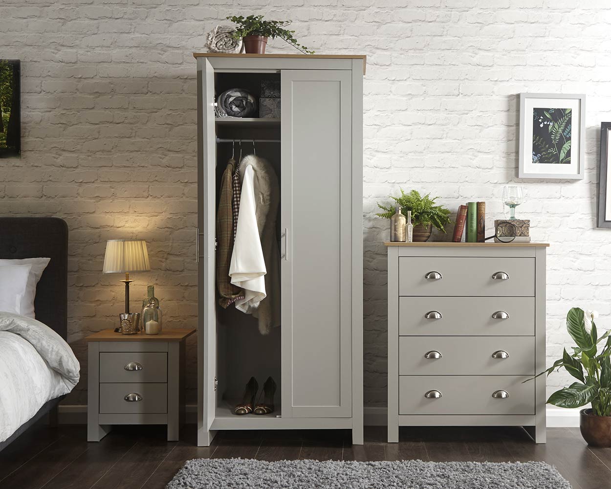 Lancaster 3 Piece Bedroom Furniture Set Grey lifestyle image in a bedroom side by side with the wardrobe door open