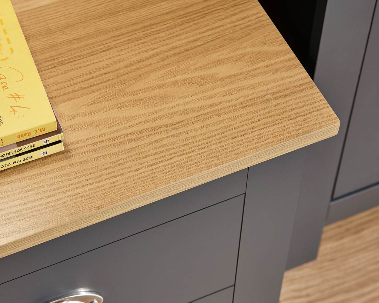 Lancaster 3 Piece Bedroom Furniture Set Slate Blue in a bedroom lifestyle setting close up of the oak effect top