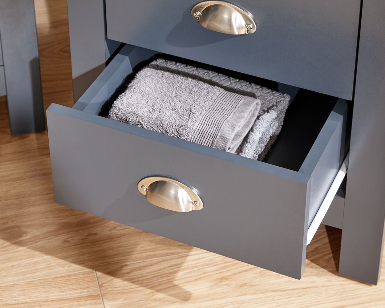 Lancaster 3 Piece Bedroom Furniture Set Slate Blue in a bedroom lifestyle setting close up of the bedside table