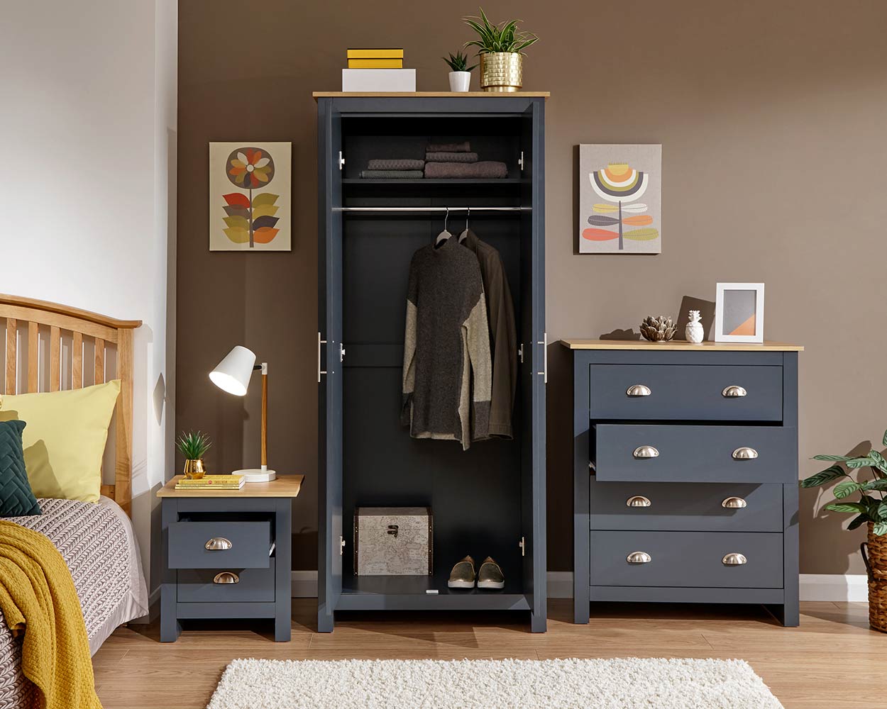 Lancaster 3 Piece Bedroom Furniture Set Slate Blue in a bedroom lifestyle setting with the doors and drawers open