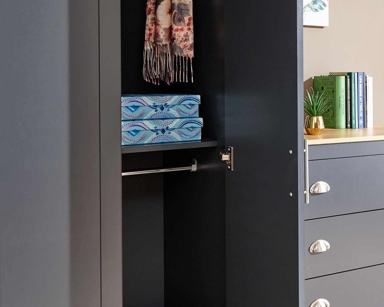 Lancaster4 piece bedroom furniture set by GFW in slate blue in a bedroom setting close up of the wardrobe space