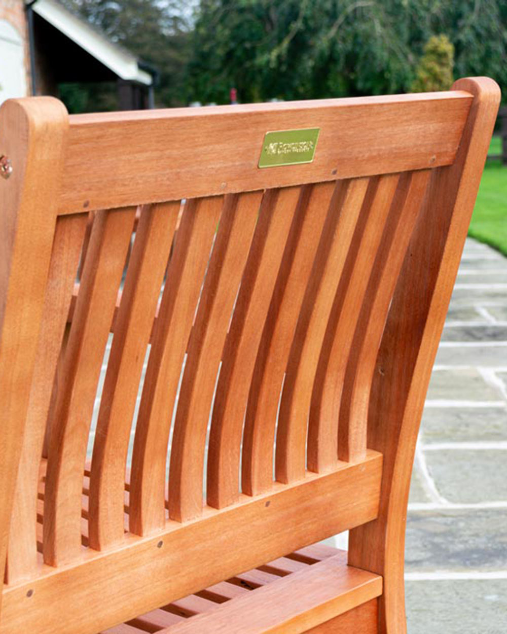 close up of the slats on the back of the wooden garden chair
