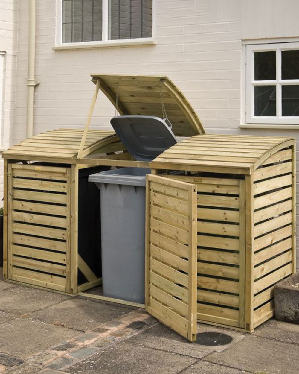 triple wheelie bin storage shed displayed outside someone's home with all bins inside, the middle bin compartment lifted and door open