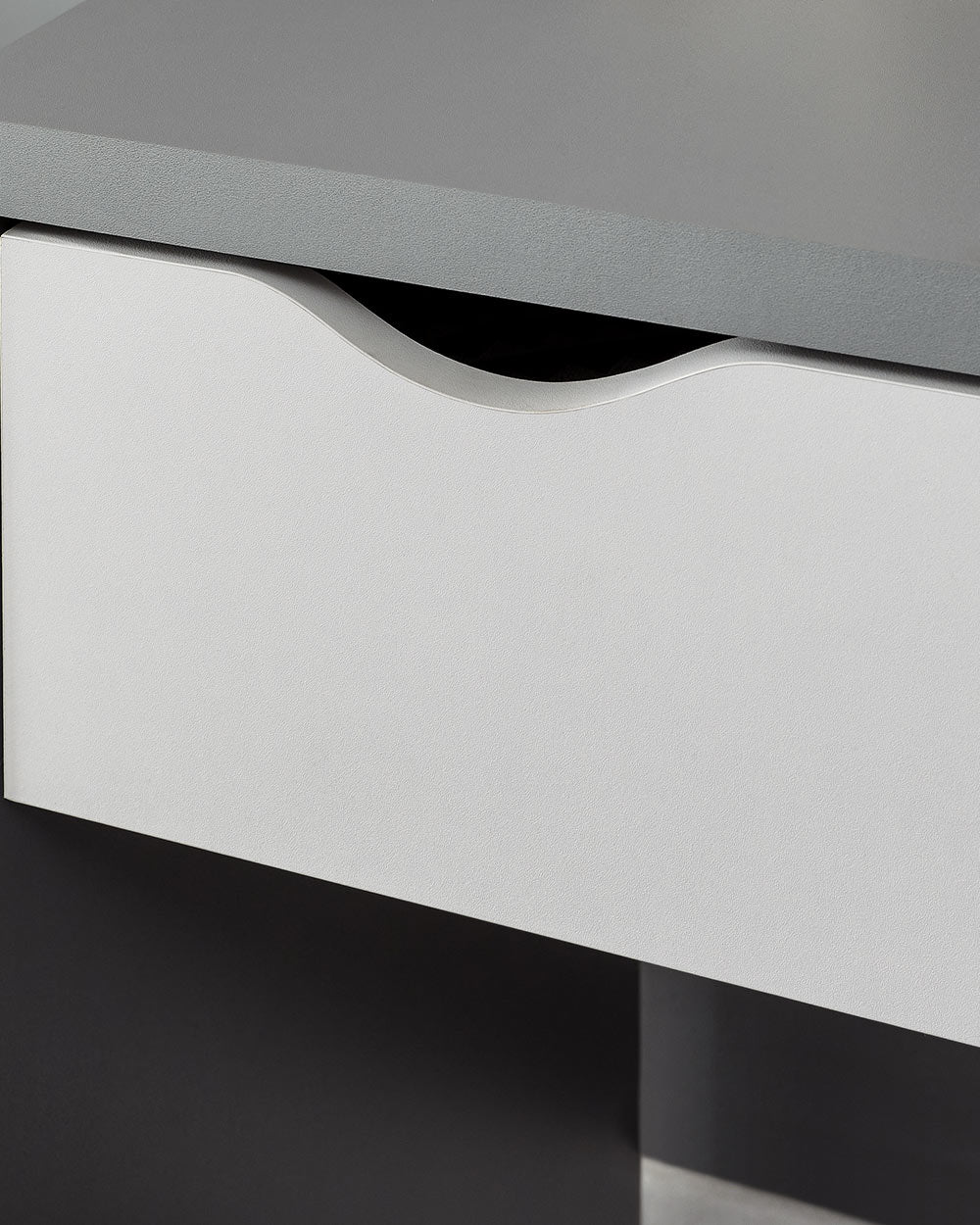 Lifestyle image of the dressing table set in a bedroom. Close up of the cut out handles