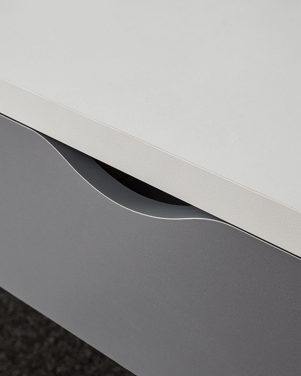 close up of the cut out handles on this dressing table set