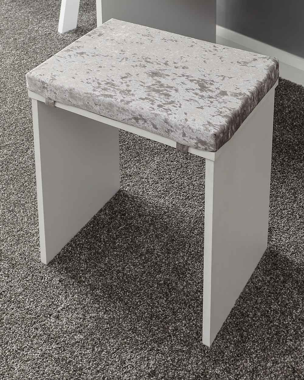 a lifestyle close up image of the dressing table stool