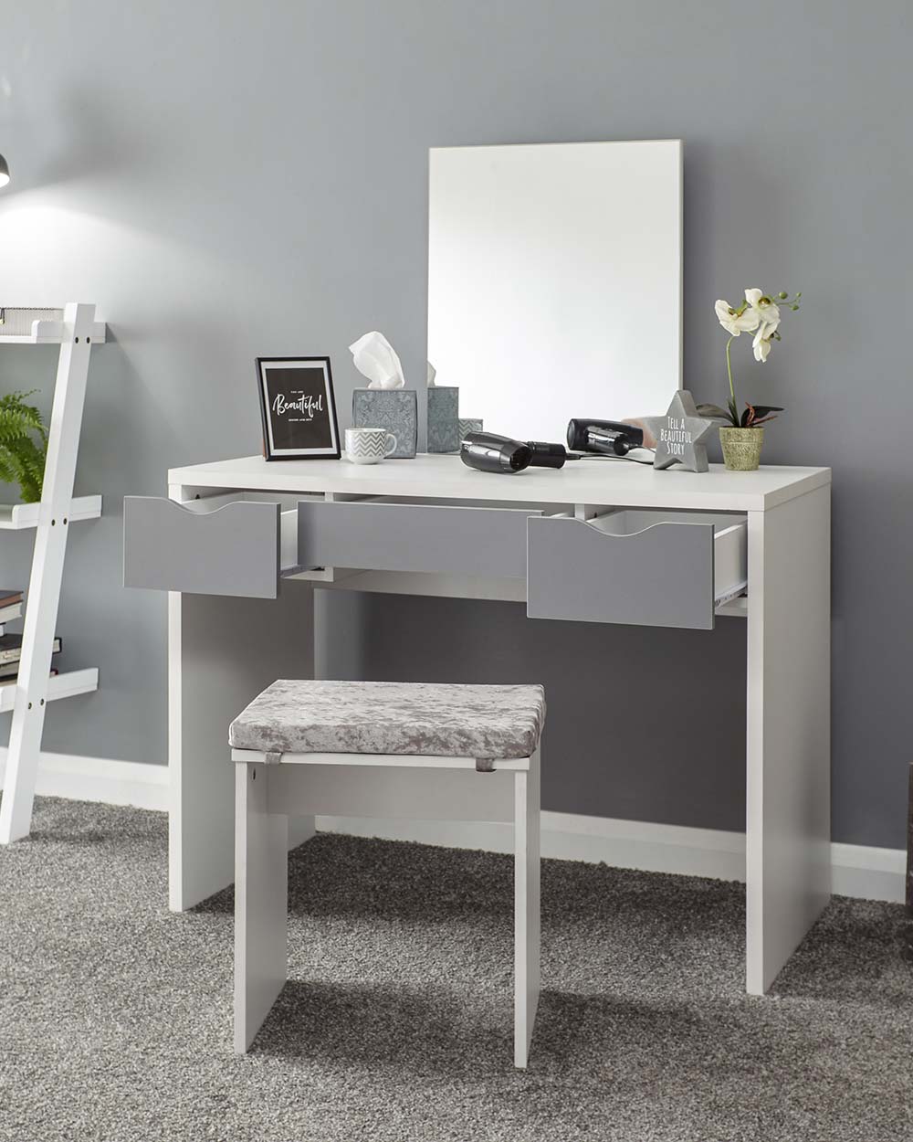 dressing table set in a bedroom to give you an overview of how it will look with the drawers open