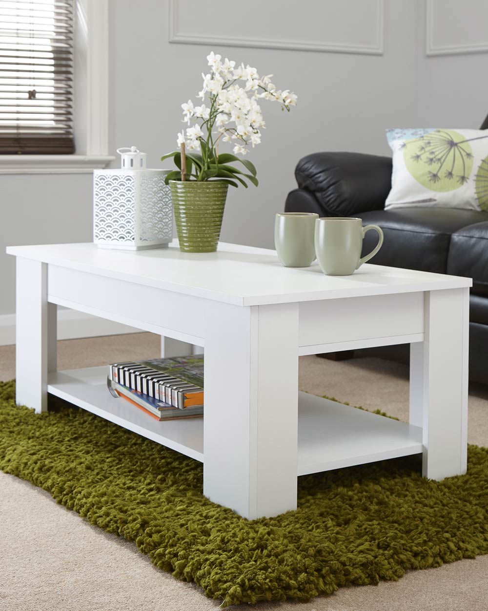 Lift up coffee table not lifted in white in a living room
