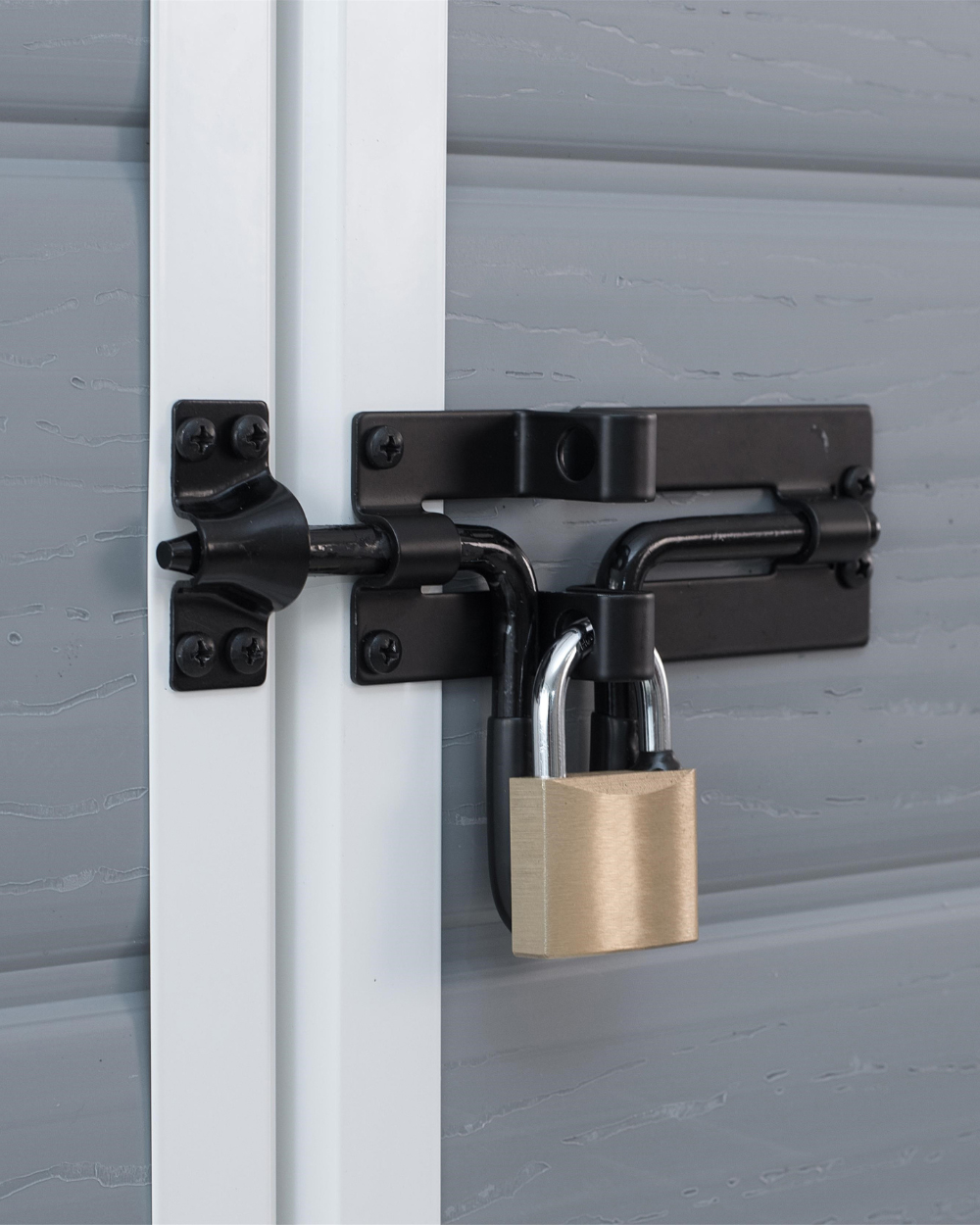 MANOR 6x5 GREY Shed Lock on a metal door with a white frame