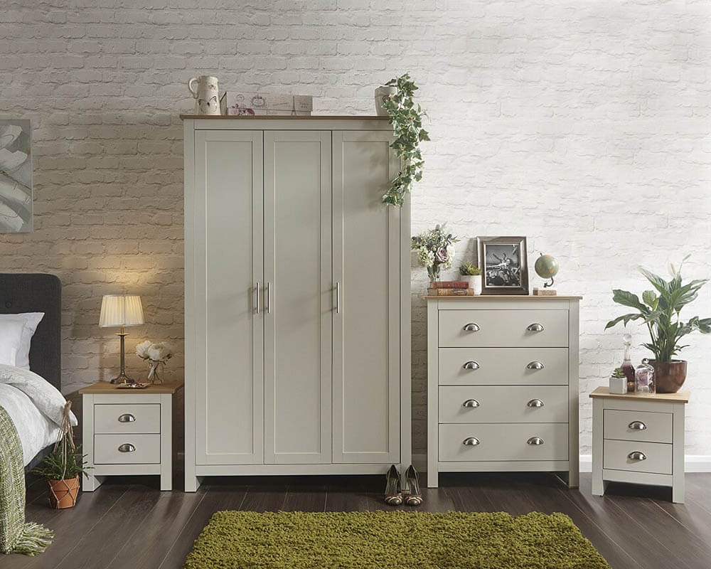 It’s easy to create a bedroom that showcases effortless chic, with this stylish four-piece furnishing pack. The shaker-inspired design exudes understated luxury. Comprising a three-door wardrobe, four-drawer chest and pair of neat lamp tables, each piece is finished in cream or grey foil with an oak top and brushed steel handles. A well-thought-out mix of hanging and flat storage that’s suitable for a double room.