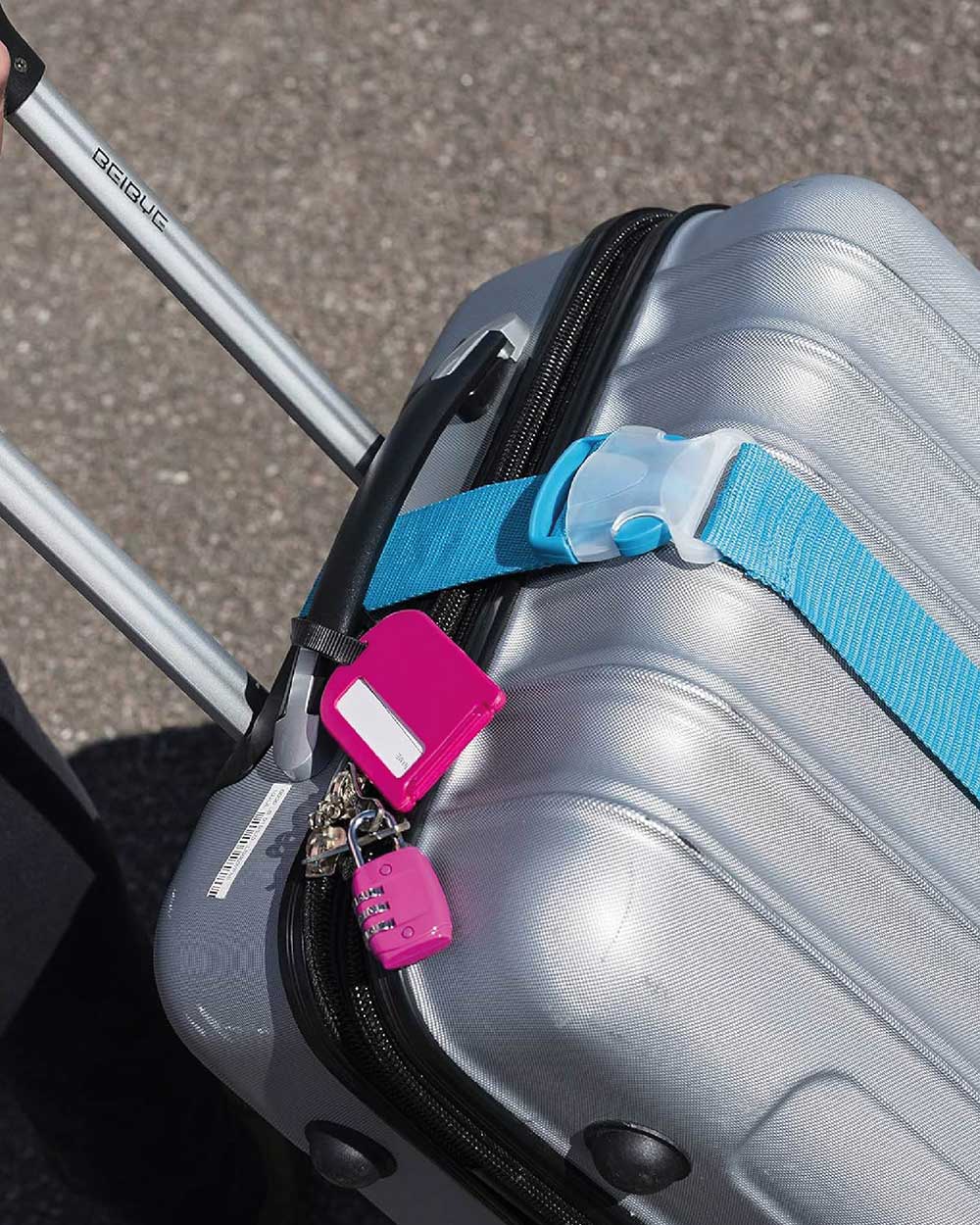 Luggage Strap Adjustable Belt Suitcase Blue lifestyle image being used on suitcase