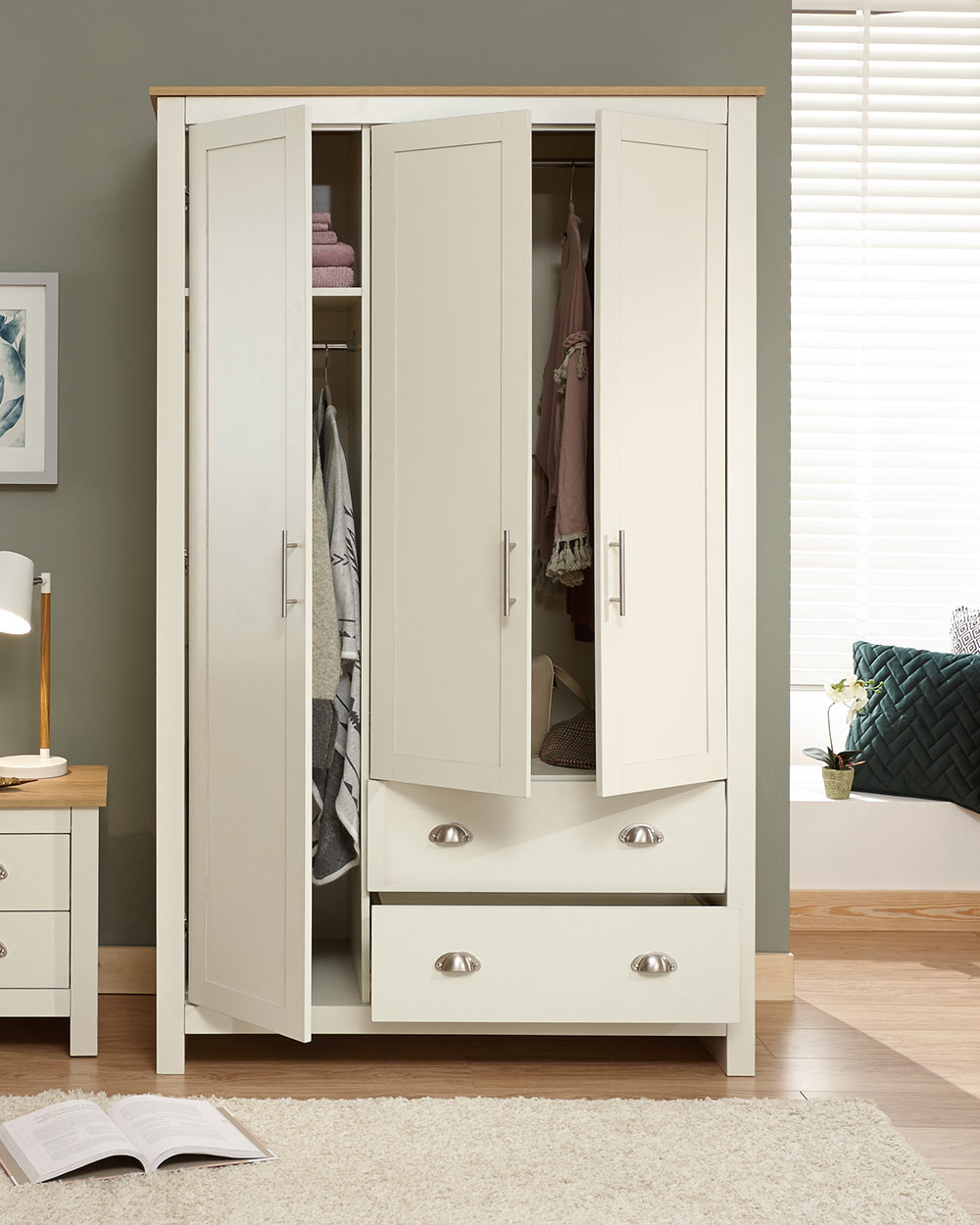 Lancaster 3 door 2 drawer wardrobe shaker style doors in a bedroom lifestyle setting with the doors open