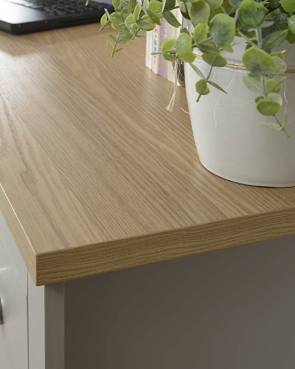 close up of the oak veneer top of this lovely desk