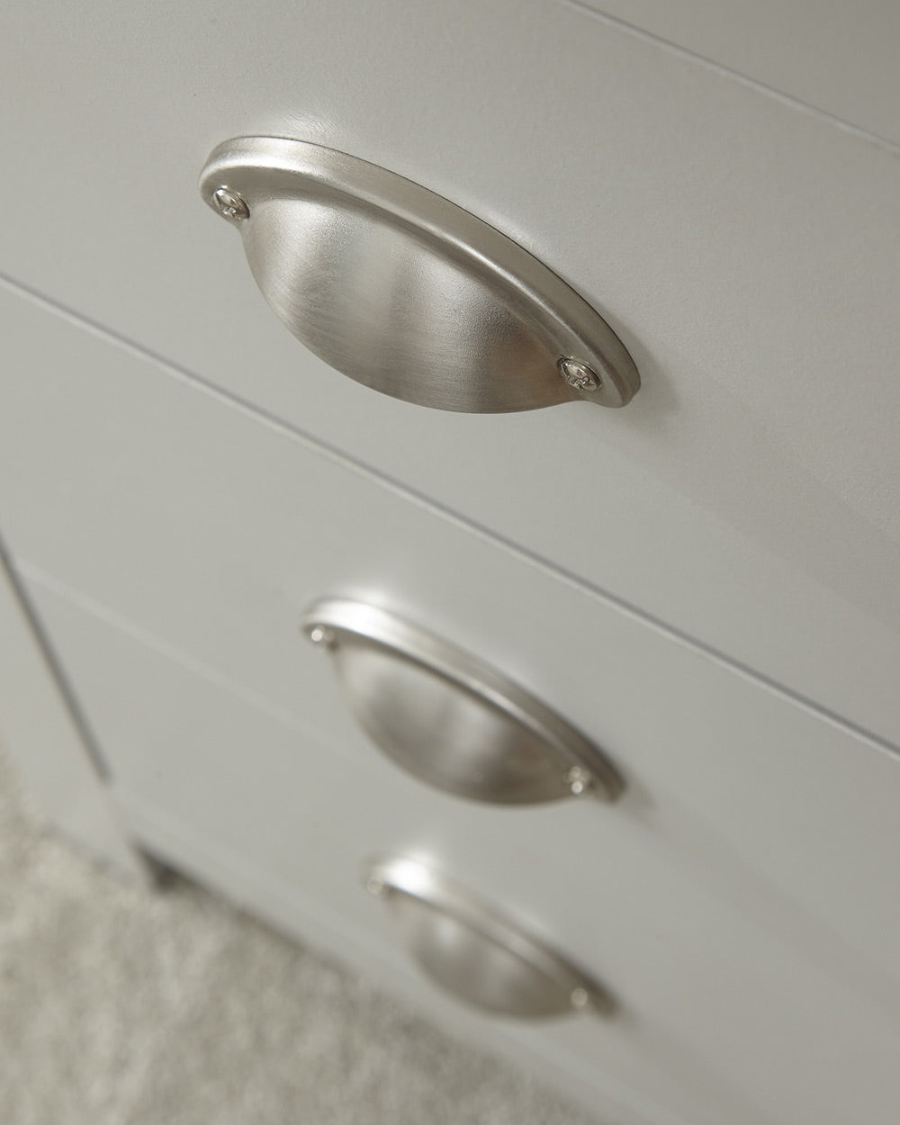 close up of the brushed effect silver handles