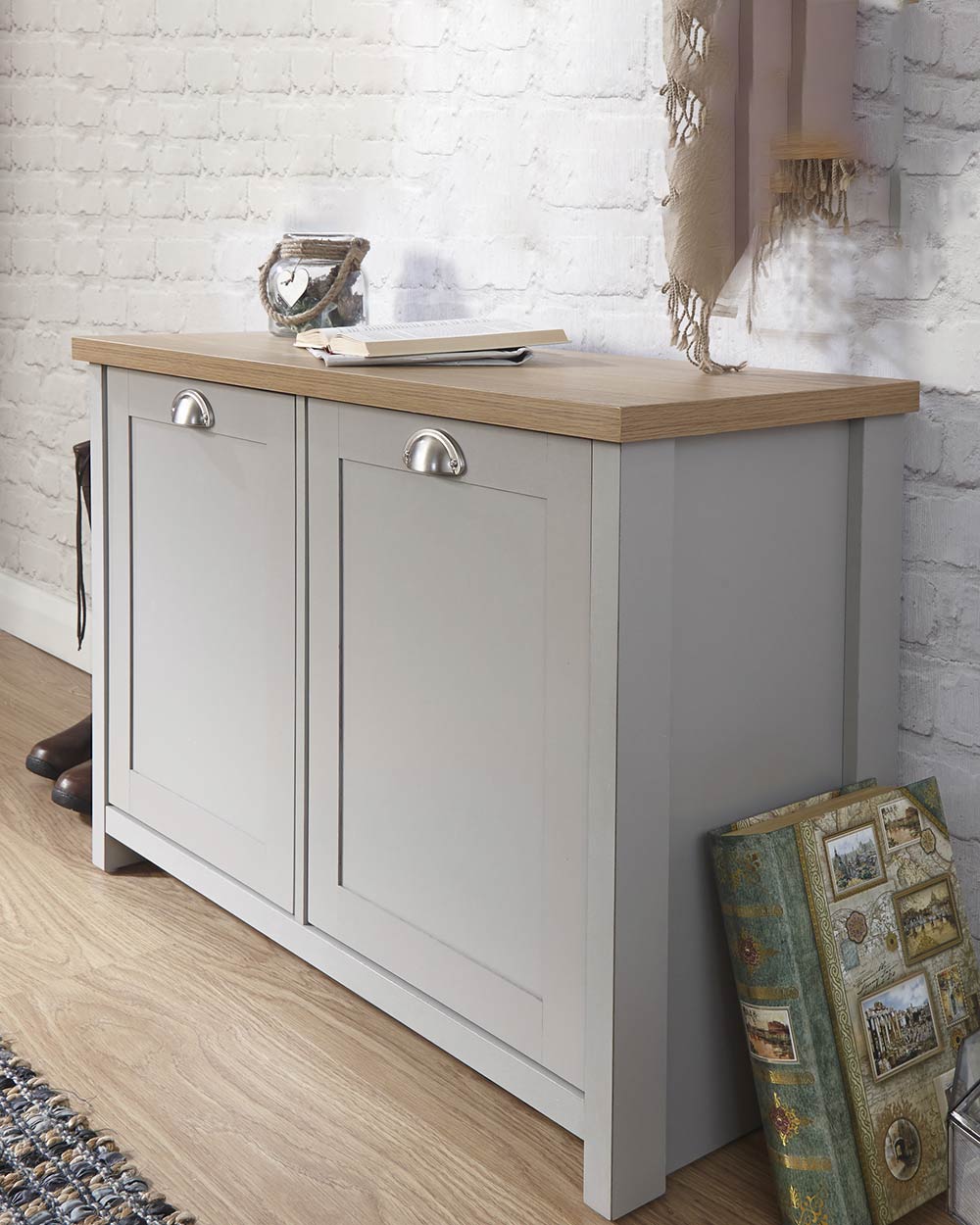 Lancaster shoe storage lifestyle inside a hallway setting. Grey with an oak effect top