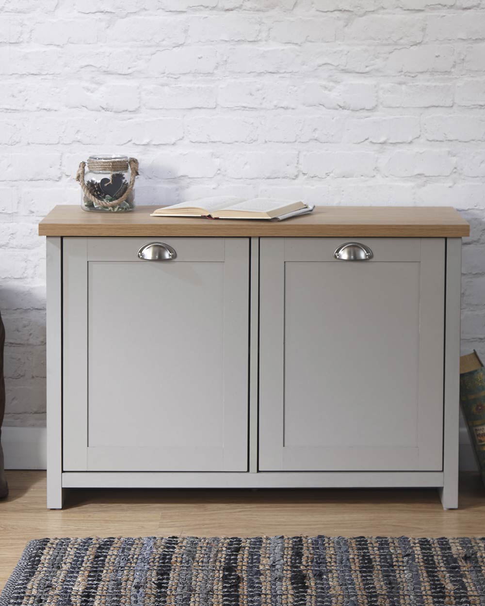 Lancaster shoe storage lifestyle inside a hallway setting. Grey with an oak effect top