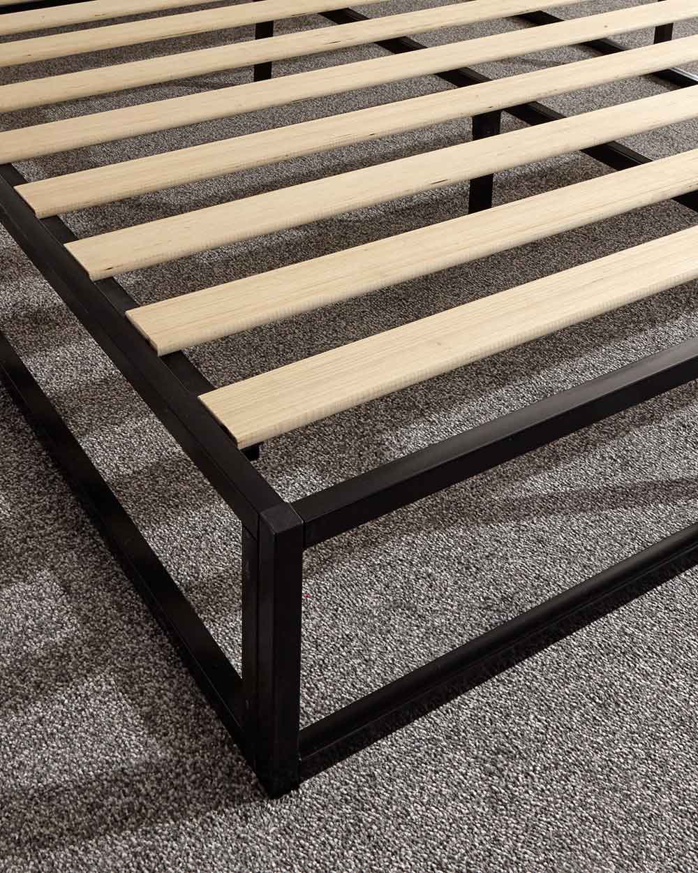 small double bed frame black industrial platform bed lifestyle image close up of the corner finishing