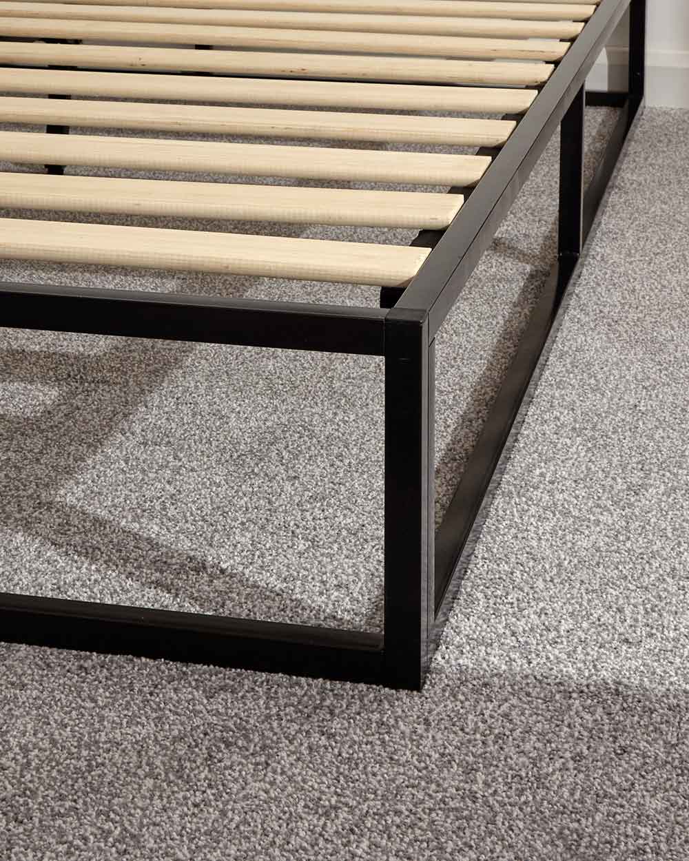 small double bed frame black industrial platform bed lifestyle image close up of the black frame