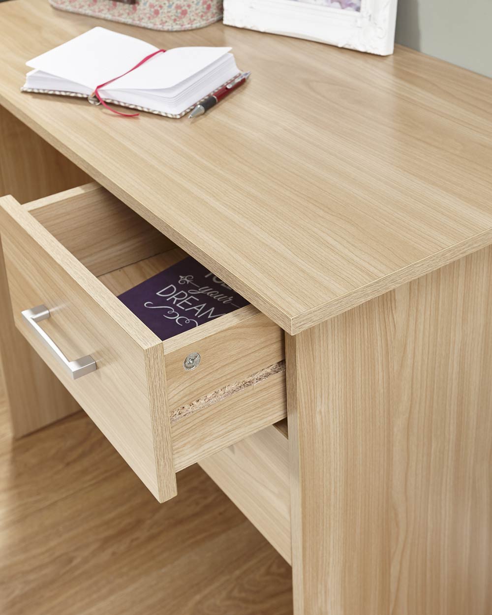 panama oak effect home office desk in a lifestyle image close up of the drawer