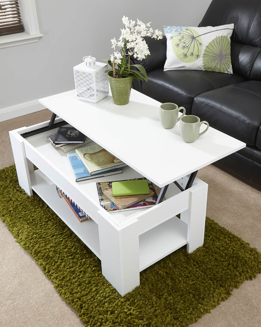 Lift up coffee table in white in a living room lifted up