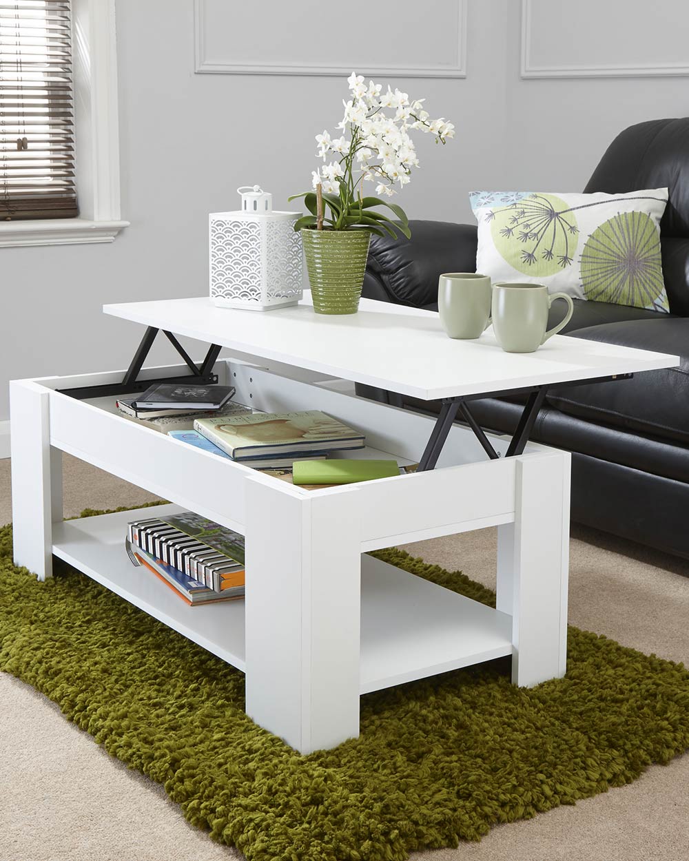 Lift up coffee table lifted in white in a living room